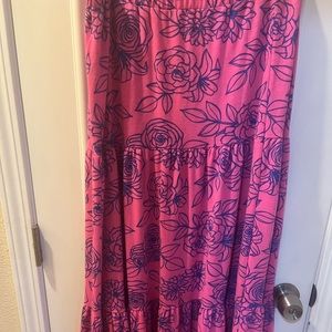 Brand new Lularoe long skirt, length 40”. Bright pink with blue flowered pattern